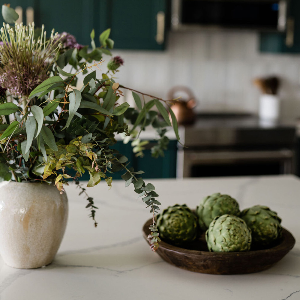 Interior Designers, upscale kitchen with flowers and produce on the counter